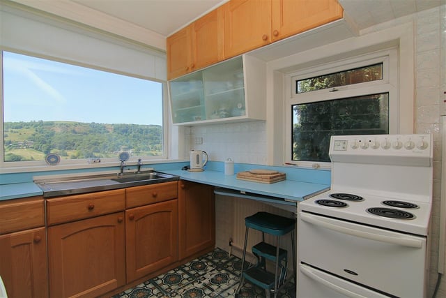 The kitchen, like many other rooms, has exceptional views from its windows.