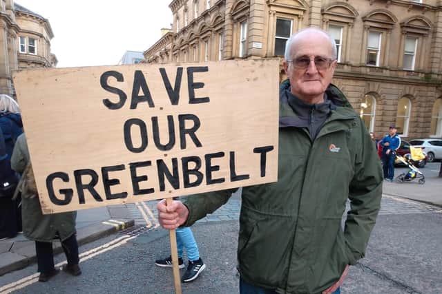 Brian Crossley, one of the Northowram and Shelf campaigners, demonstrates outside Halifax Town Hall ahead of the Calderdale Local Plan vote