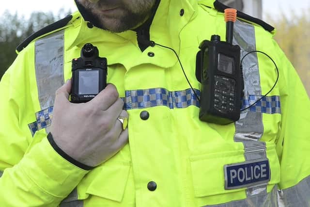 A West Yorkshire Police officer with a body worn video camera