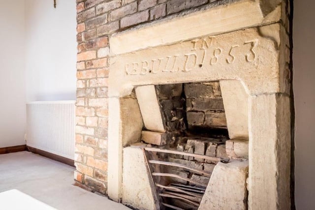 A lovely old fireplace within the property is one outstanding feature.