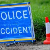 Road blocked and queueing traffic in Hipperholme after a crash