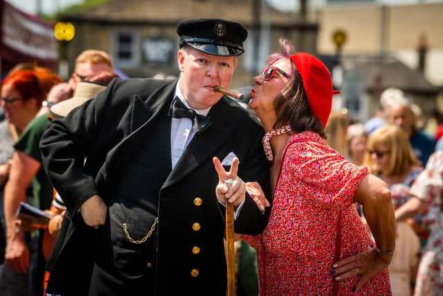 Actor Steve McTigue, dressed as Winston Churchill, with Martine Delaney, a member of the Brighouse Town and District Inner Wheel, at this year's Brighouse 1940s Weekend