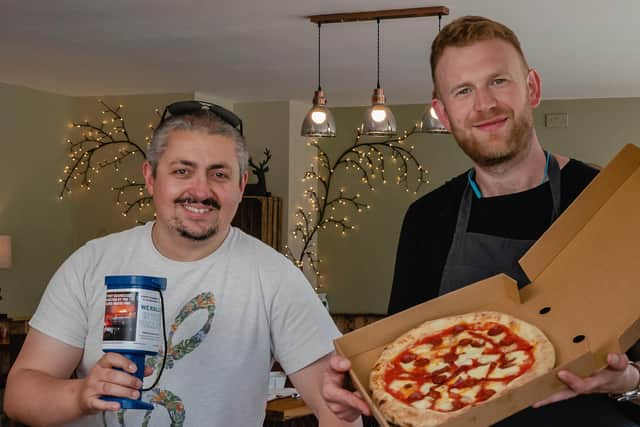 Peter Hunt, community campaigner and Elliott Hinchliff, owner of Elliott's Craft Pizza and Grill. Picture by Cameron McGarvey