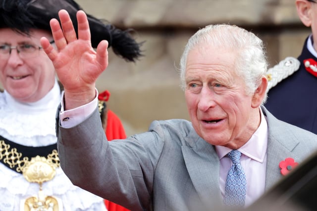King Charles III waves as he departs a reception at Bradford City Hall during an official visit to Yorkshire on November 08, 2022 (Photo by Chris Jackson/Getty Images)