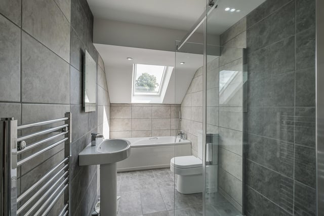 A sleek and modern bathroom within the annexe