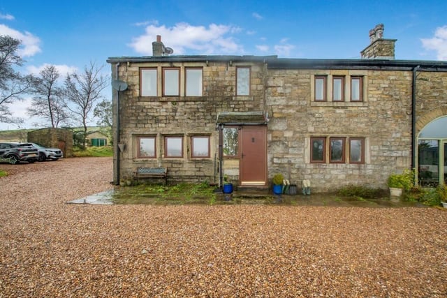 The five-bedroom farmhouse in its quiet and scenic location near Todmorden.