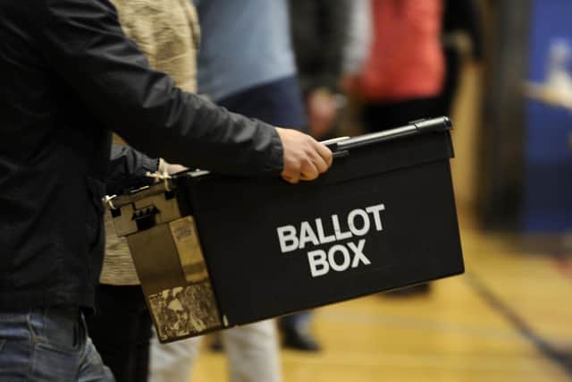 A ballot box being taken into an election count 