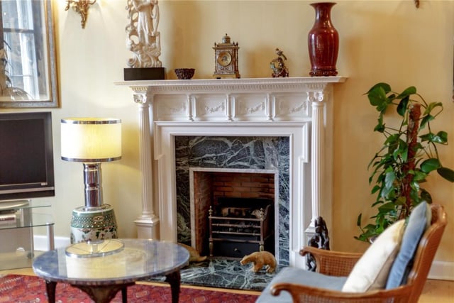 Drawing room feature fireplace.