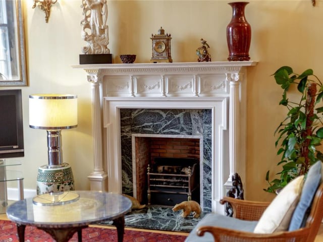 Drawing room feature fireplace.