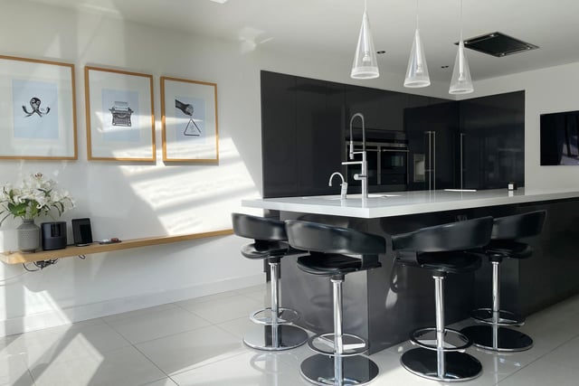 Breakfast bar seating within the high spec kitchen area.