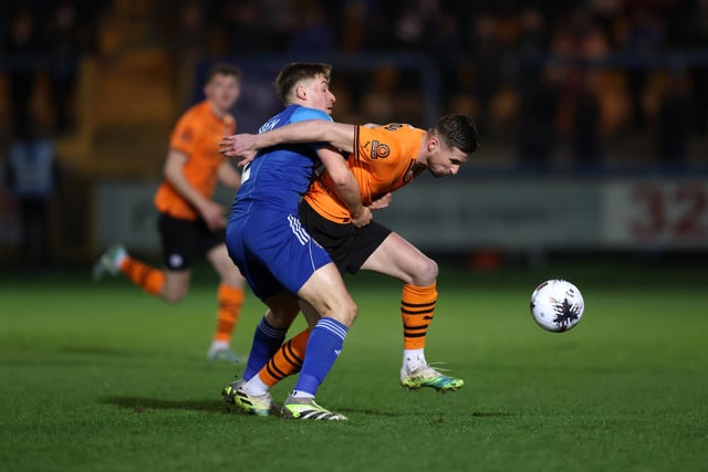 HALIFAX, ENGLAND - MARCH 20: Ryan Colclough of Chesterfield is challenged by Tylor Golden of FC Halifax Town during the Vanarama National League match between FC Halifax Town and Chesterfield at The Shay on March 20, 2024 in Halifax, England.  (Photo by George Wood/Getty Images)