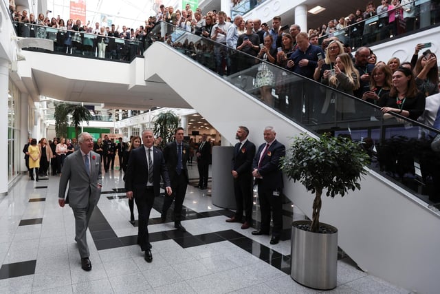 King Charles III walks with David Potts, chief executive of Morrisons Supermarkets, at its headquarters during an official visit to Yorkshire on November 8, 2022 in Bradford (Photo by Russell Cheyne - WPA Pool/Getty Images)