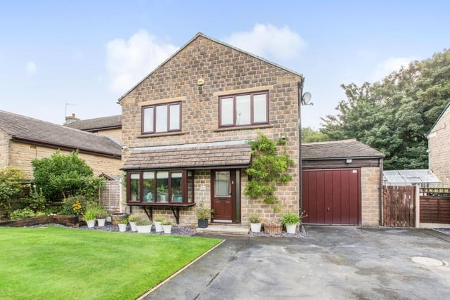 The property, marketed for offers of more than £450,000, is set on a generous plot in a sought-after location.