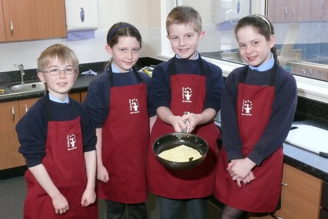 Preparing pancakes in their new kitchen at Carr Green Primary School, Rastrick back in 2009.