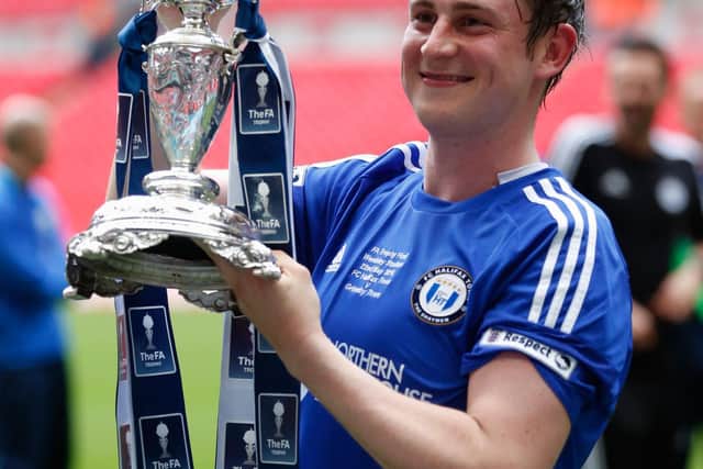 LONDON, ENGLAND - MAY 22:   Sam Walker of Halifax Town with the FA Trophy after the FA Trophy Final match between Grimsby Town FC v FC Halifax Town at Wembley Stadium on May 22, 2016 in London, England.  (Photo by Joel Ford/Getty Images)