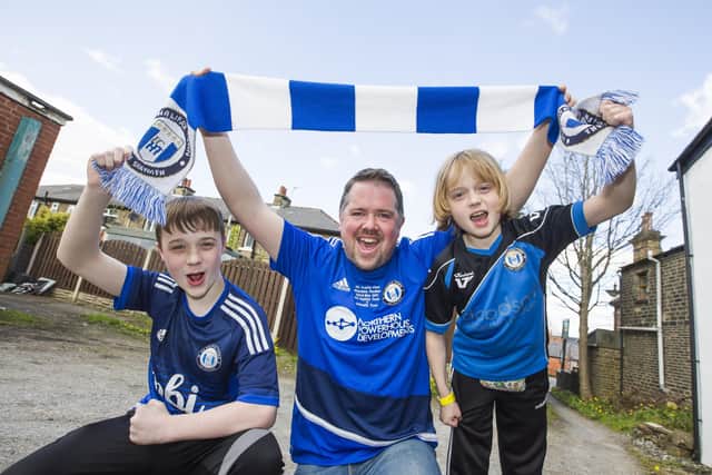 FC Halifax Town Fans looking forward to Wembley. Jason Ward with sons Ben Ward, 14, left, and Toby Ward, 11, right.