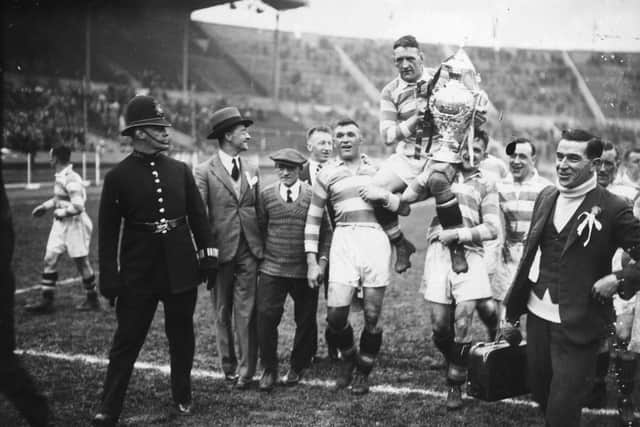 2nd May 1931: The Halifax Rugby League team celebrating their win over York in the Challenge Cup Final at Wembley Stadium, London. (Photo by J. Gaiger/Topical Press Agency/Getty Images)