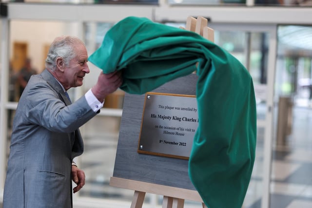 King Charles III unveils a plaque at Morrisons Supermarkets headquarters during an official visit to Yorkshire on November 8, 2022 in Bradford (Photo by Russell Cheyne - WPA Pool/Getty Images)
