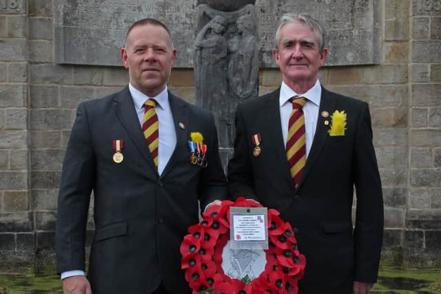 Authors Steven Wright, left, and Bryan Earnshaw, at the War Memorial in Todmorden's garden of Remembrance at Centre Vale Park