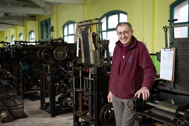 Collections director Tim Kirker, with the old spinning and twisting frames being prepared for display at Calderdale Industrial Museum