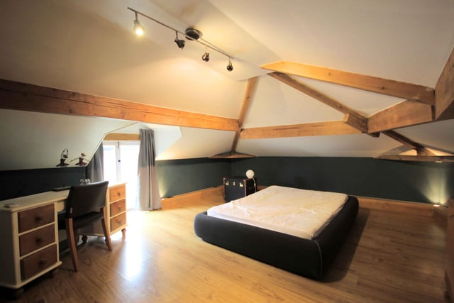 A loft room within the property, with study space.