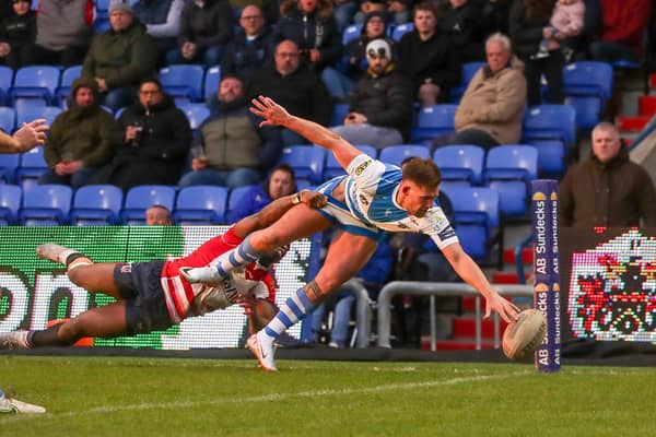 Greg Eden scores his second try in the 24-20 defeat at Oldham. (Photo by Simon Hall).