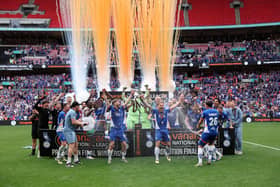 LONDON, ENGLAND - JUNE 01: Charlie Raglan and Tom Conlon of Oldham Athletic lift the trophy following victory in the Vanarama National League Promotion Play-off Final between Oldham Athletic and Southend United at Wembley Stadium on June 01, 2025 in London, England. (Photo by Richard Pelham/Getty Images)