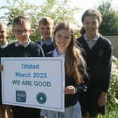 Children from Holywell Green Primary School celebrate their Ofsted report