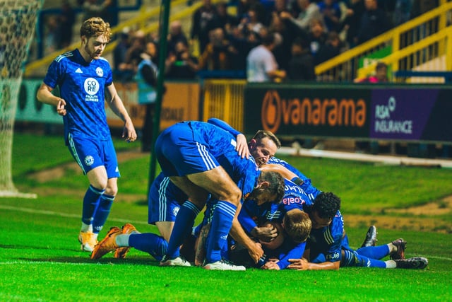 Town celebrate one of their goals