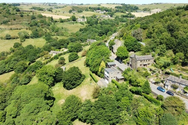 An aerial view of the cottage and its surroundings.