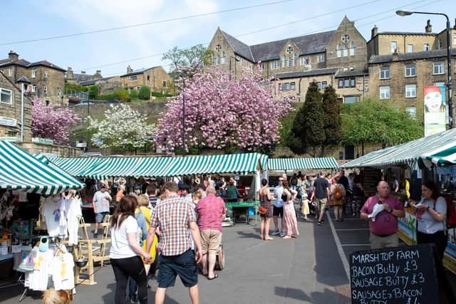 The bustling outdoor market at Lees Yard in Hebden Bridge town centre.