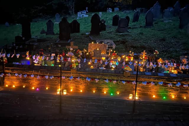 A special evening of remembrance brought families, volunteers and members of the community together at Stoney Royd Cemetery on Thursday.