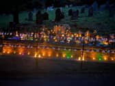 A special evening of remembrance brought families, volunteers and members of the community together at Stoney Royd Cemetery on Thursday.