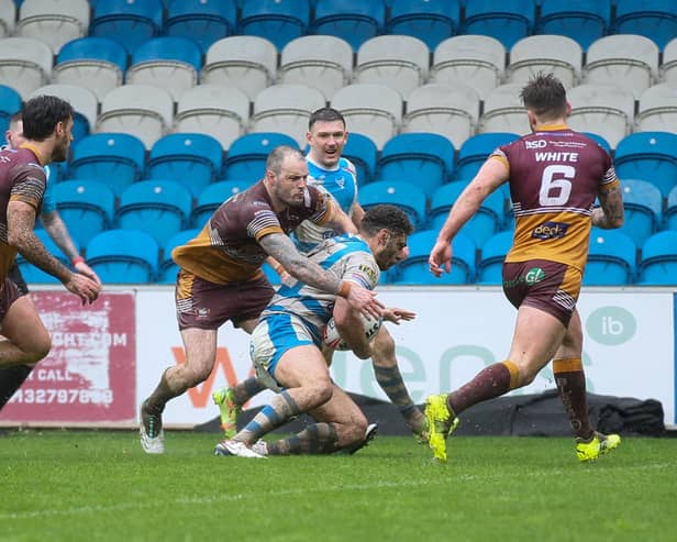 James Woodburn-Hall goes over for Halifax's second try against Batley Bulldogs last Sunday. Photo by Simon Hall.