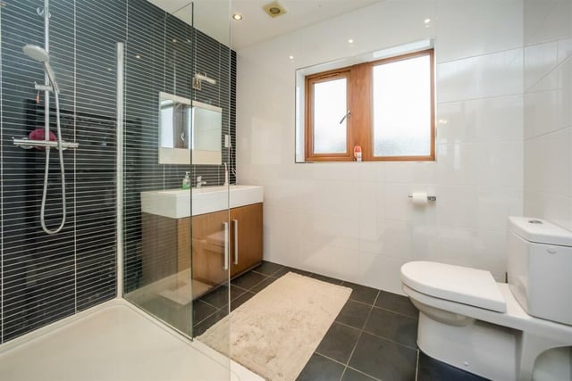 Bath and shower rooms are modern and stylish.