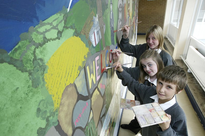 Putting the finishing touches to their mural at St Catherine's school, Holmfield back in 2007.