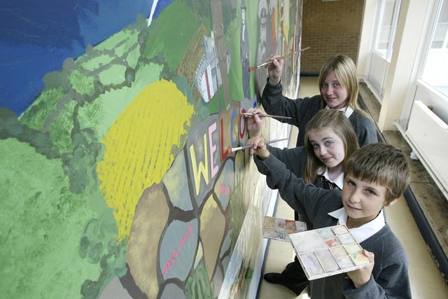 Putting the finishing touches to their mural at St Catherine's school, Holmfield back in 2007.