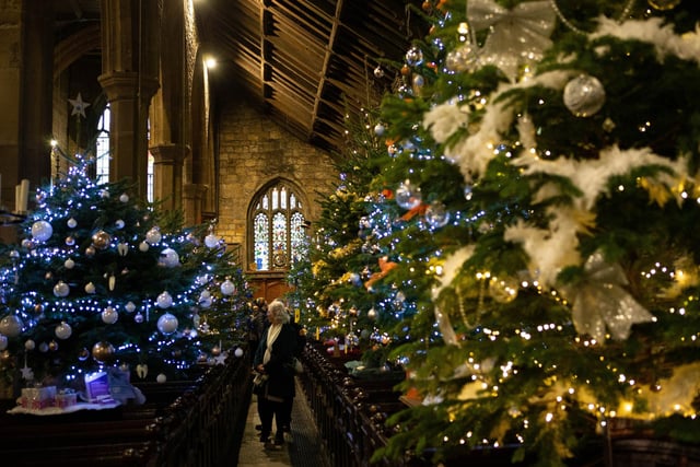 Visitors enjoy Halifax Minster Christmas Tree Festival