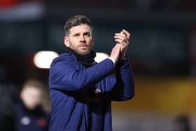 ACCRINGTON, ENGLAND - JANUARY 24: Luke Garrard, Manager of Boreham Wood, acknowledges the fans after defeat ing the Emirates FA Cup Third Round Replay match between Accrington Stanley and Boreham Wood at Wham Stadium on January 24, 2023 in Accrington, England. (Photo by George Wood/Getty Images)
