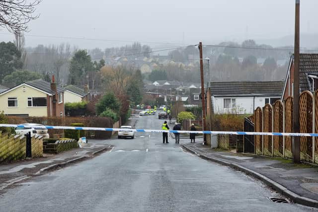Police at the scene on Kenmore Road in Cleckheaton