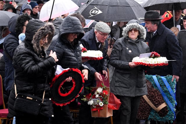 Families of the victims lay wreaths at the memorial.