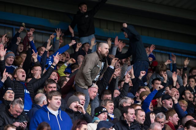 Town fans cheering on their team