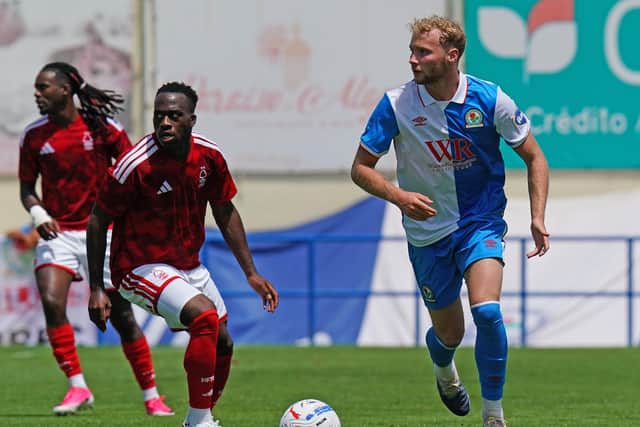 FERREIRAS, PORTUGAL - JULY 22: Lucas Houghton of Blackburn Rovers FC with Arnaud Kalimuendo of Nottingham Forest FC in action during the Pre-Season Friendly match between Blackburn Rovers and Nottingham Forest at Estadio da Nora on July 22, 2026 in Ferreiras, Portugal. (Photo by Gualter Fatia/Getty Images)