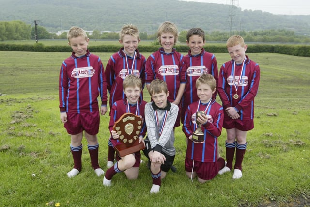 Members of the Old Earth school, Elland, 6-a-side football team in 2004 who won the Mortgage Search U.K. inter schools under 11's world cup.