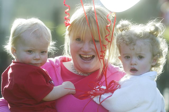 From the left, William Horsfall, one, nursery nurse Zara Carlton and Grace Jowett, 18 months, at the Valentine's party and 13th birthday celebration of Triangle House Private Day Nursery in 2008