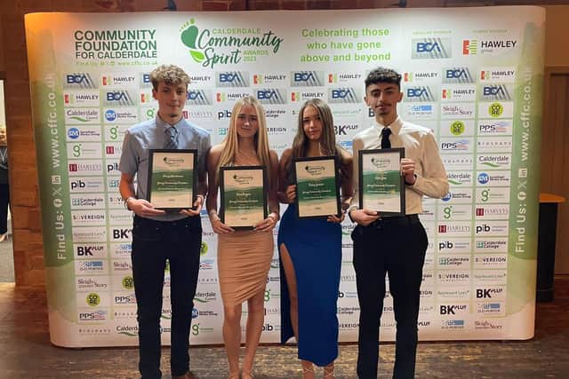 Ruby, Harry, Keira, and Mal with their awards