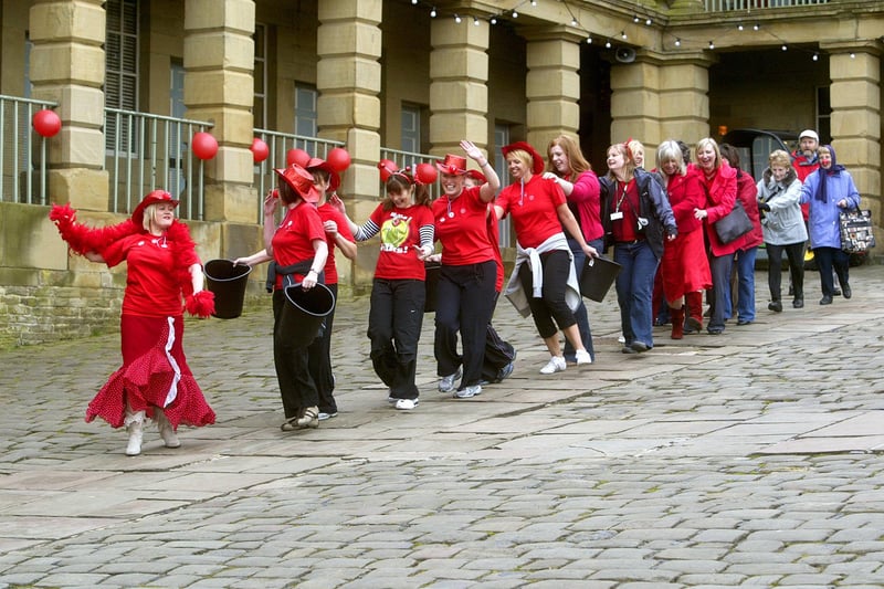 Ladies from Calderdale Council Leisure Services lead a conga around the Piece Hall, Halifax in 2009