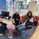 Enjoying coffee and cake at our coffee morning for Breast Cancer Now.