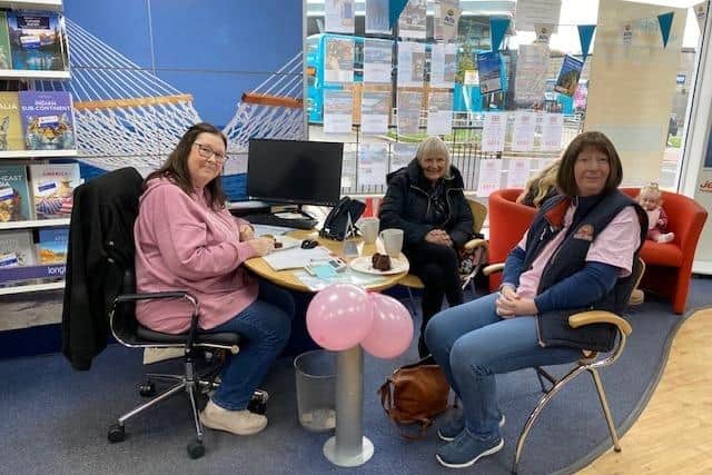Enjoying coffee and cake at our coffee morning for Breast Cancer Now.