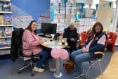 Enjoying coffee and cake at our coffee morning for Breast Cancer Now.